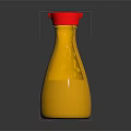 Kikkoman Soy Sauce Bottle With Red Cap And Yellow Liquid In Transparent Container