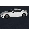 Silver Sports Car Two Door Coupe With Sleek Aerodynamic Body And Black Alloy Wheels