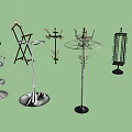 Various Stylish Metal Clothes Hangers With Decorative Designs And Floor Stand Bases