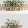 Two Outdoor Chairs with Small Table and Bamboo Plants Behind Lattice Fence
