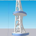 Modern Spiral Tower With Observation Deck Against Mountain And Blue Sky