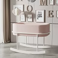 Pink Baby Crib With White Rocking Frame And Decorative Wall Art Letters