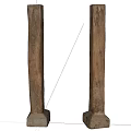 Antique Rustic Wooden Pillars With Textured Surfaces And Stone Bases