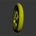 Round Yellowish Object With Multiple Holes And Rough Surface On Gray Background