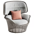 Modern Wicker Leisure Chair with Light Gray Cushion and Pink Pillow