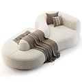 Bouclé Fabric Beige Curved Sectional Sofa With Brown Throw Blanket And Decorative Pillows