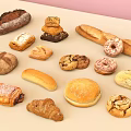 Assorted Baked Goods Collection Featuring Bread Donuts Cookies Croissants Baguette and Hamburger Bun