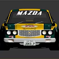 Mazda Yellow And Green Racing Car With Number 19 On Body