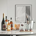 Elegant Assorted Wine Whiskey Bottles and Glasses with Decanter Ice Bucket Macarons and Abstract Art