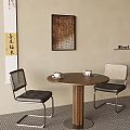 Elegant Negotiation Table And Chairs With Round Wooden Top Metal Frame And Black Cushions