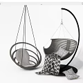 Modern Hanging Chairs with Woven Design Metal Frame Cushions and Geometric Pattern Blankets