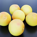 Fresh Ripe Vibrant Grapefruits with Yellow and Pink Spots on Black Surface