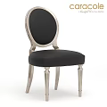 Modern Black Upholstered Stool With Silver Metal Frame And Carved Legs Design