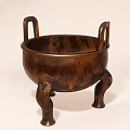 Traditional Bronze Colored Ceramic Vessel With Three Legs And Two Handles