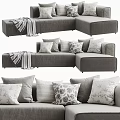 L Shaped Gray Modular Sofa Set With Decorative Pillows And Soft Blanket 3d model