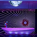 KTV Lounge Interior With Illuminated Moon Purple Blue Lighting And Radial Neon Lines