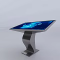 Interactive Touchscreen Table As Public Facility With Blue Interface And Modern Metal Frame