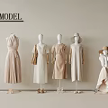 Elegant Beige Shoes Showcased On Fashion Model Mannequins With Dresses And Minimalist Background