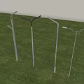 Modern Outdoor Lights with Various Designs Standing on Green Grass for Garden Lighting