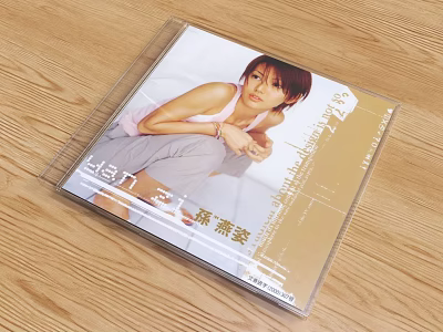 General CD with Transparent Case on Wooden Table Cover Featuring Person as Daily Living Essential 3d model