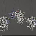 Beautiful Hanging Flowers and Plants with White Pink Purple Blooms Green Leaves Gray Background
