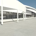 Modern White Building Exterior With Glass Curtain Walls And Sleek Architectural Design