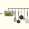 Cooking Utensils On Wall Mounted Metal Rod With Wire Basket Holding Green Fruits In Kitchen