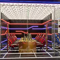 Modern Esports Gaming Cafe With Neon Lights High End Computers And Gaming Chairs