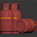 Red Indane Brand LPG Cylinders Standing And Lying On Black Surface