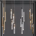 Modern Chandelier With Slim Metal Pendants And Clear Glass Illuminated Design