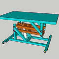 Green Tabletop Scissor Lift Table With Orange Mechanism And Wheel Base