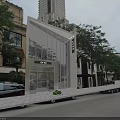 Modern Full View Glass Fashion Store Showcases Along Vibrant Downtown Commercial Shopping Street