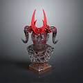 Ornate Head Sculpture With Red Horns And Metal Mesh Structure On Base