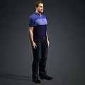 Man in Blue Purple Polo Shirt and Dark Jeans Standing Against Dark Background