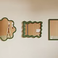 Three Wall Mounted Decorative Mirrors With Green Frames And Different Shapes 3d model