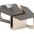 Modern Geometric Coffee Table With Black Tabletop Metal Frame And Decorative Silver Object