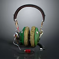 Vintage Design Headphones With Green Beige Ear Cushions Brown Headband And Red Plug Cable
