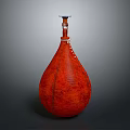 Red Leather Teardrop Shaped Decorative Vase With White Stitching And Black Lid