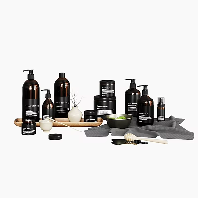 Natural Home Washing Essentials With Brown Bottles Black Containers And Gray Cloth 3d model