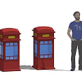 Red Public Phone Booths With Glass Windows And A Man Standing Beside