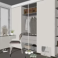 Modern Walk-in Closet Design With White Cabinets Hanging Clothes Mirror Chair Round Rug And Decor