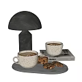 Speckled Coffee Mugs With Cookies On Table Alongside Modern Lamp And Book