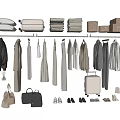 Stylish Clothes Hanging On Racks With Fashionable Bags Shoes And Accessories