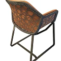 Stylish Leisure Chair With Grid Pattern Woven Design And Orange Cushion Dark Metal Frame