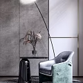 Modern Blue Leisure Chair With Gray Wall Gold Trim Black Side Table Dried Flower Vase