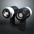 Two Black Portable Wireless Earbuds With White Trim And Circular Speakers 3d model