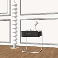 Black Nightstand with Drawer Silver Lamp and White Cup on Light Wainscoting Wall Wooden Floor