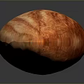 Close Up View Of Fresh Whole Almond With Natural Brown Striped Skin On Dark Background