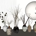 Various Ceramic Vases With Dried Branches On Minimalist Light Colored Wall With Circular Decor