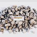Pile of Natural Stone and Wood Pieces with Various Sizes and Textures